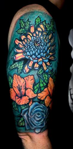 flowers-family-teals-arm-tattoo