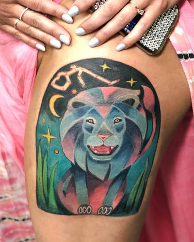 lion-watercolor-star-scene-tattoo